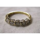 Gold 5 stone diamond ring