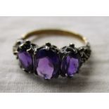 Gold 3 stone amethyst set ring