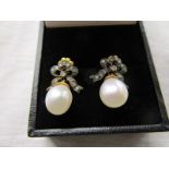 Pair of pearl & diamond set earrings