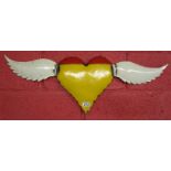 Heart with wings oil can sculpture