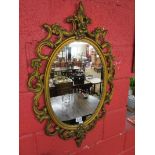 Oval gilt framed mirror