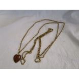 Gold guard chain with heart pendant