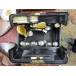 Leather traveling case with fitted bottles & brushes