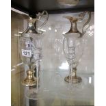 Pair of claret jugs and pair of hand blown candle sticks