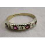 Gold ruby & diamond set ring