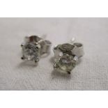 Pair of 18ct gold ¼ct diamond stud earrings