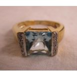 Designer blue topaz and diamond set ring