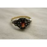 Gold garnet & diamond cluster ring