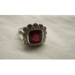 Fine ruby & diamond cluster ring in 18ct white gold