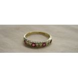 Gold ruby & diamond set ring