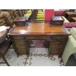 Edwardian mahogany writing desk with galleried top