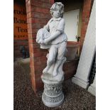 Stone statue of boy on plinth - H: 168cm