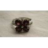 Silver & garnet set ring