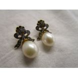 Pair of pearl and diamond earrings