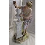 Figurine - Female stone mason