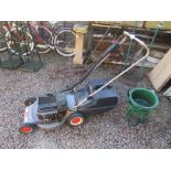 Rotary petrol lawn mower