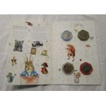 4 Beatrix potter 50 pence's in collectors folder