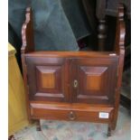 Small mahogany wall mounted cupboard