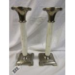 Pair of white metal and bone shafted candlesticks