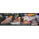 4 boxed Star Wars vehicles