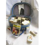 Small suitcase containing tea & cigarette cards etc