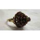Gold stone set cluster ring