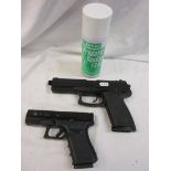 2 CO2 pistols with can of gas