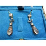 Pair of moonstone & diamond earrings