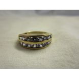 Gold double row tanzanite ring