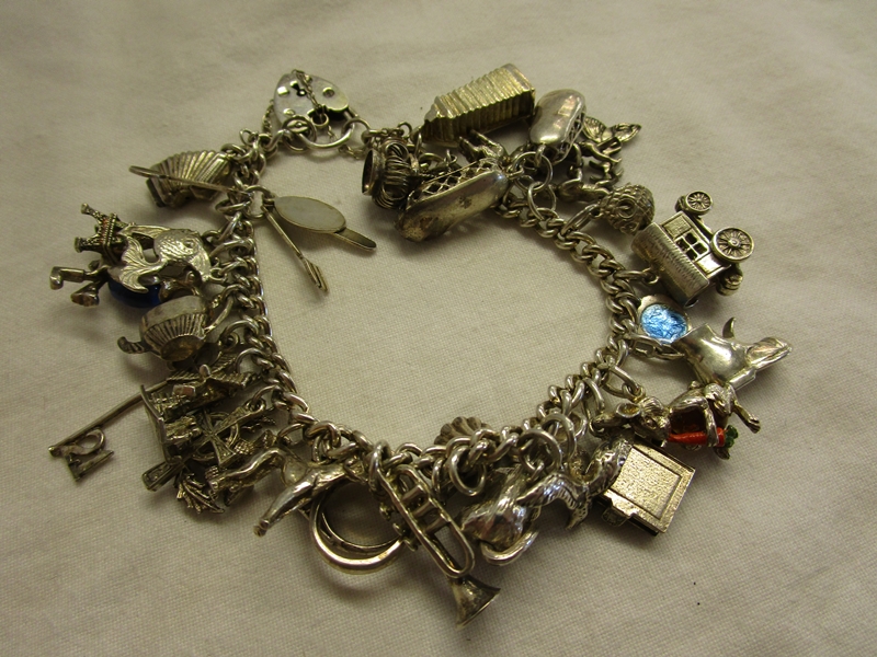 Heavy silver charm bracelet