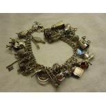 Heavy silver charm bracelet