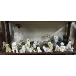 Shelf of dog figures - Mostly Old English sheep dogs to include Royal Doulton