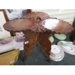 Folding Oriental carved table