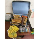 Suitcase containing collection of cribbage boards