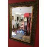 Gilt framed bevelled mirror