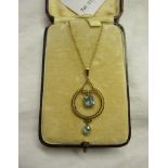 Edwardian gold aquamarine pendant on chain