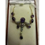 Amethyst, seed pearl, emerald, peridot & diamond pendant on chain