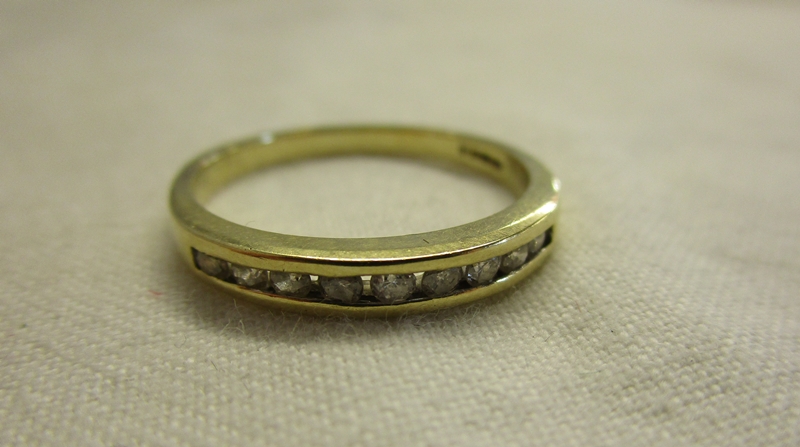 Gold channel set diamond ring (.25cts)