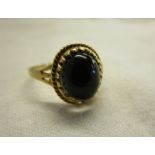 Gold stone set amber ring