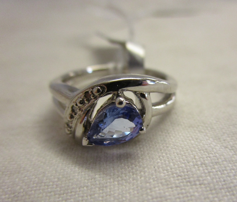 Silver tanzanite and diamond set ring