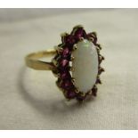 Gold opal & ruby set ring