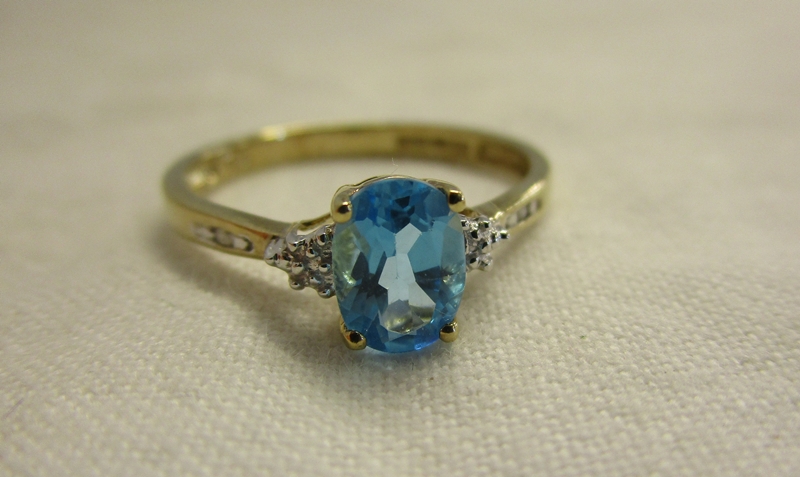 Gold blue topaz & diamond ring