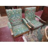 Pair of mid century teak framed armchairs