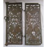 Pair of early brass pierced grill doors