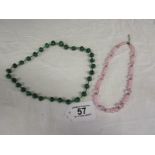Antique malachite necklace together with a rose quartz necklace