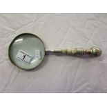 Magnifying glass with ornate handle