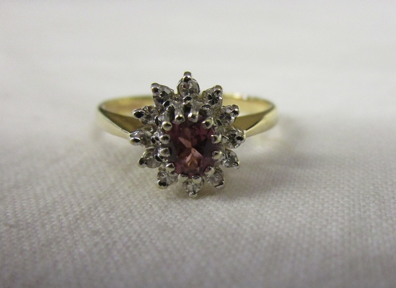 Gold, ruby & diamond cluster ring