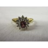 Gold, ruby & diamond cluster ring