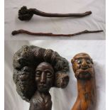 2 primitive carved sticks (1 club)