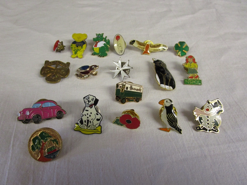 Collection of enamel stud brooches